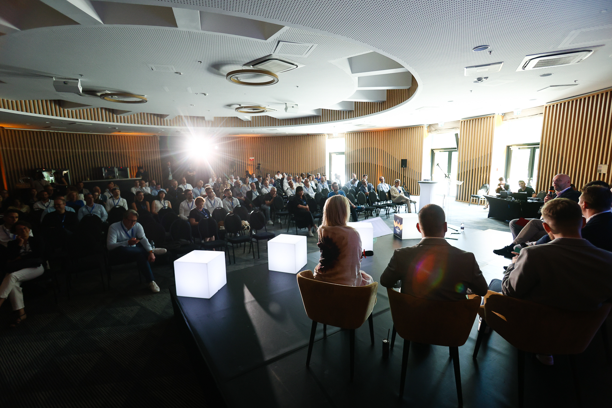 Conference panel and audience
